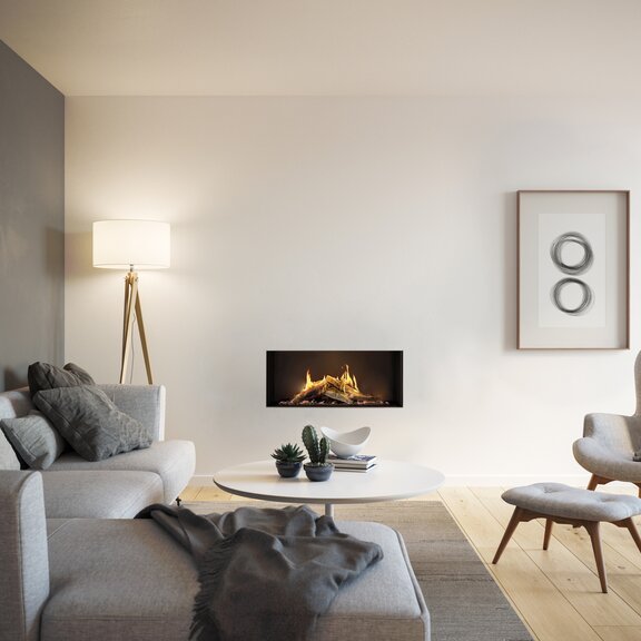 Inserto camino a gas VISIO 100 con vetro frontale in parete bianca e zona living decorativa