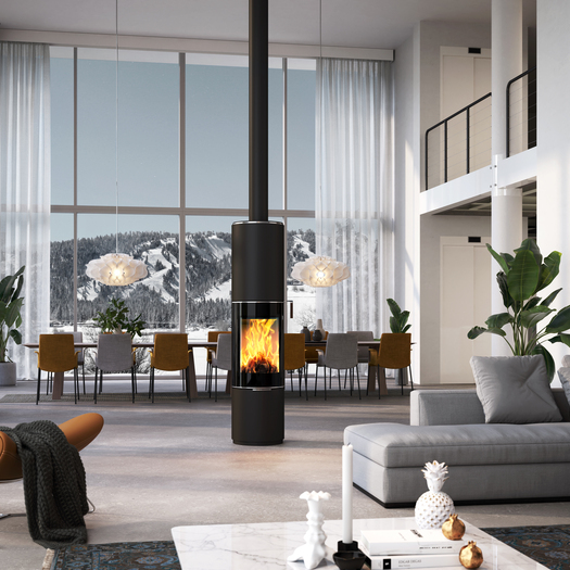 PILAR in black with glass door Wood stove PILAR in black with glass door as a rotating, round stove in the centre of a huge living room