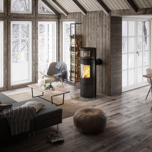 VIVA L oven in black with integrated baking compartment Wood stove VIVA L oven in black with integrated baking compartment, in which fresh bread is baked with the heat of the fire