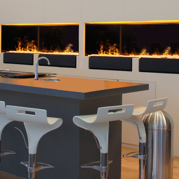 Feu électrique Cassette L Pebbles avec décoration de galets encastré dans la cuisine