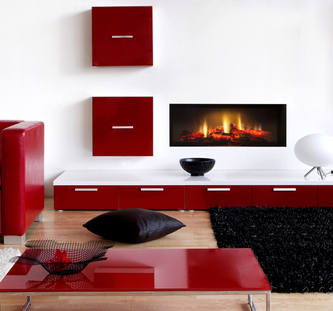 Elektrofeuer Opti-V-Single im weissen Wohnzimmer mit roten Möbeln Elektrofeuer Opti-V-Single im Wohnzimmer mit roten Möbeln an weisser Wand eingebaut