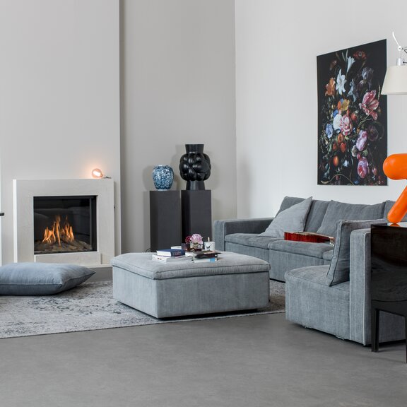 MatriX 800/650 front gas fireplace from Faber installed in a white wall in the living room