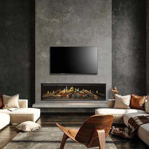 Il caminetto elettrico frontale E-One 160 F in un loft urbano, installato su una parete di cemento nel soggiorno. 